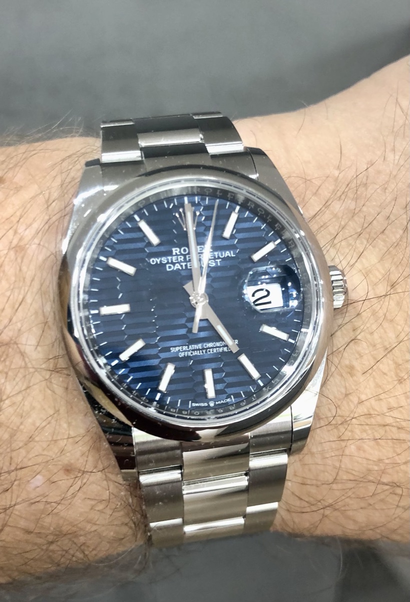 Rolex Datejust 36 with a blue fluted-motif dial, worn on the wrist